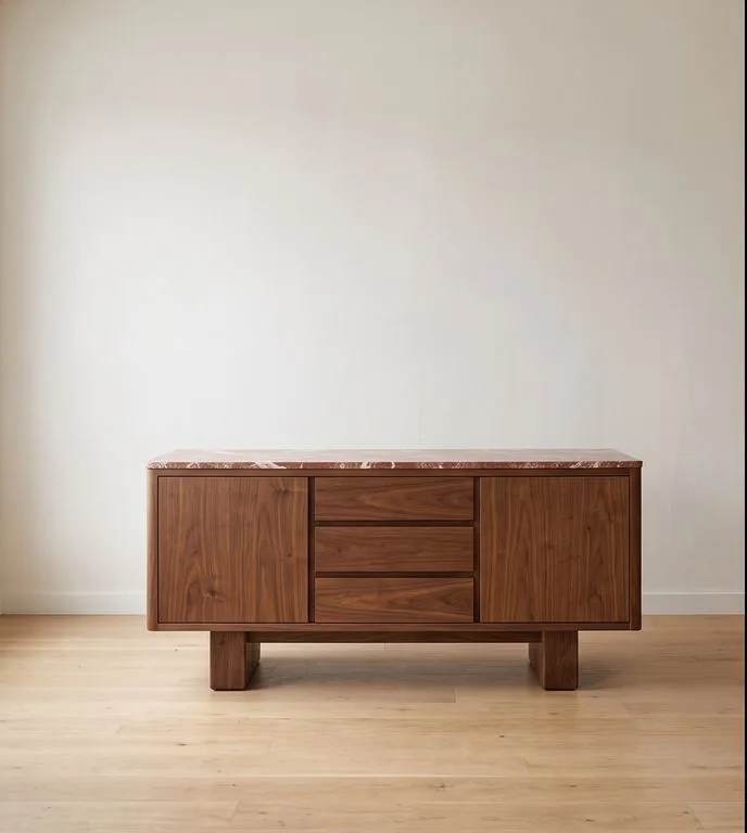 Walnut sideboard with a Rosso Levanto top, two cupboards and three drawers, photographed against a plain wall.